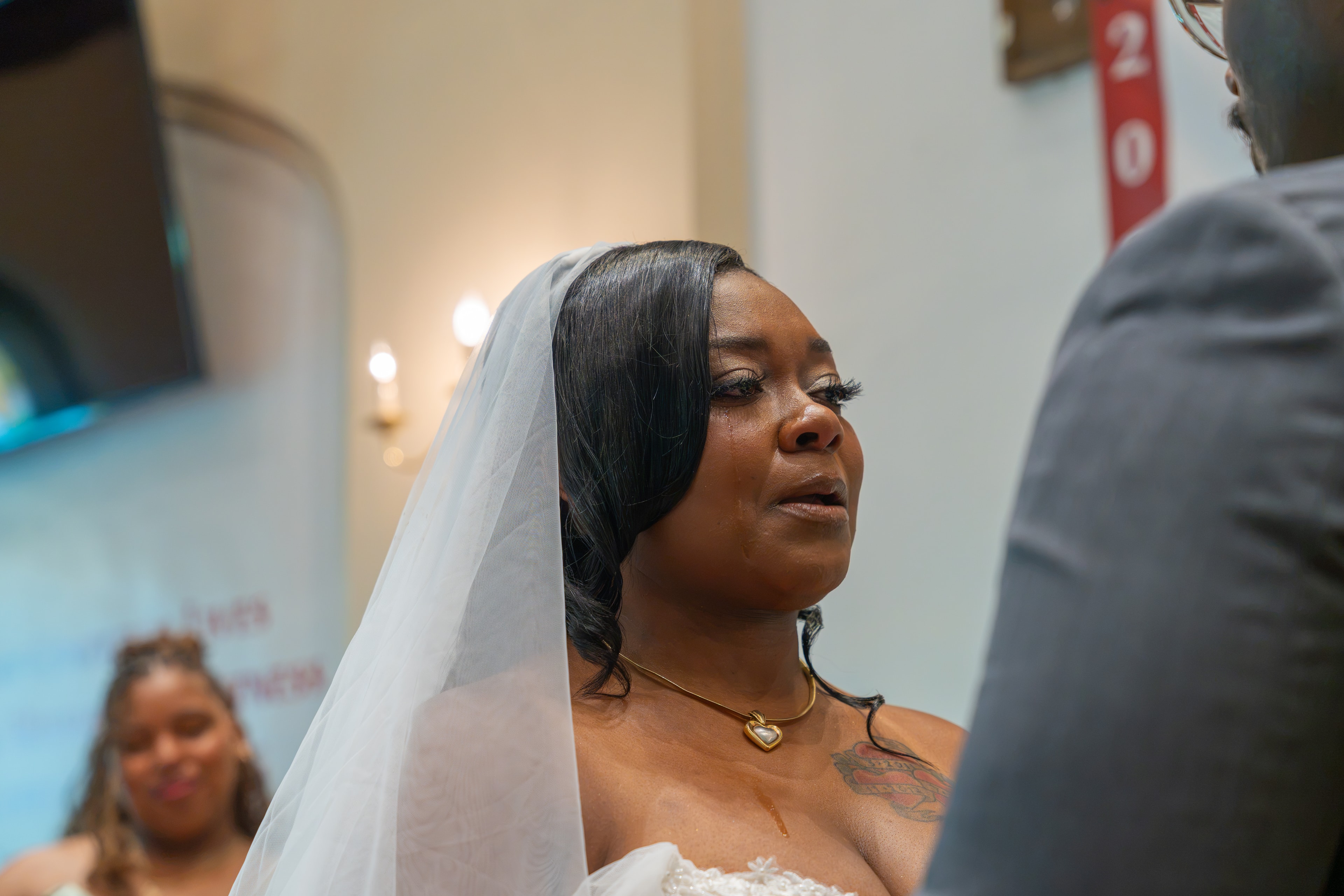Bride emotional during vows at the altar