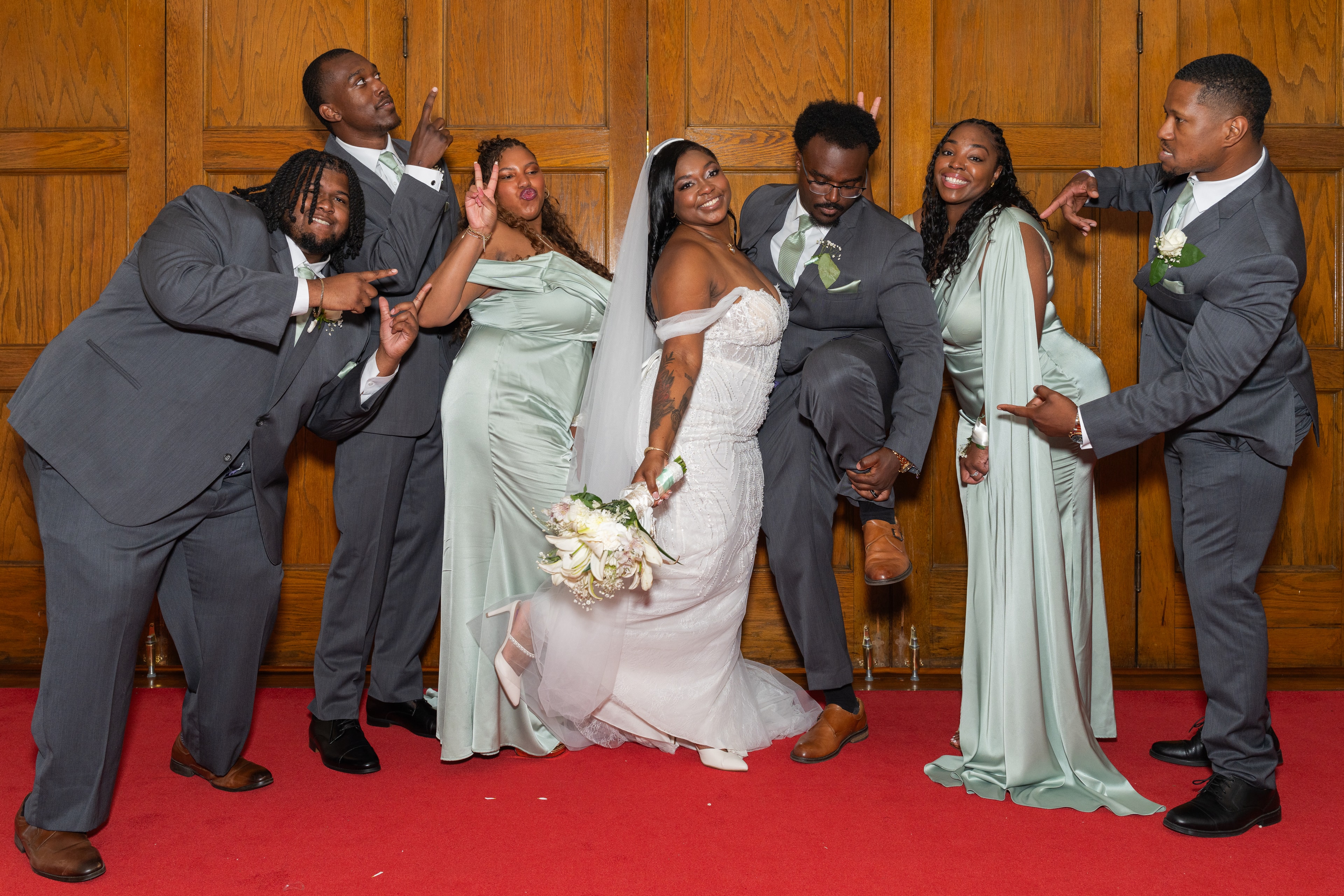 Full wedding party fun group portrait