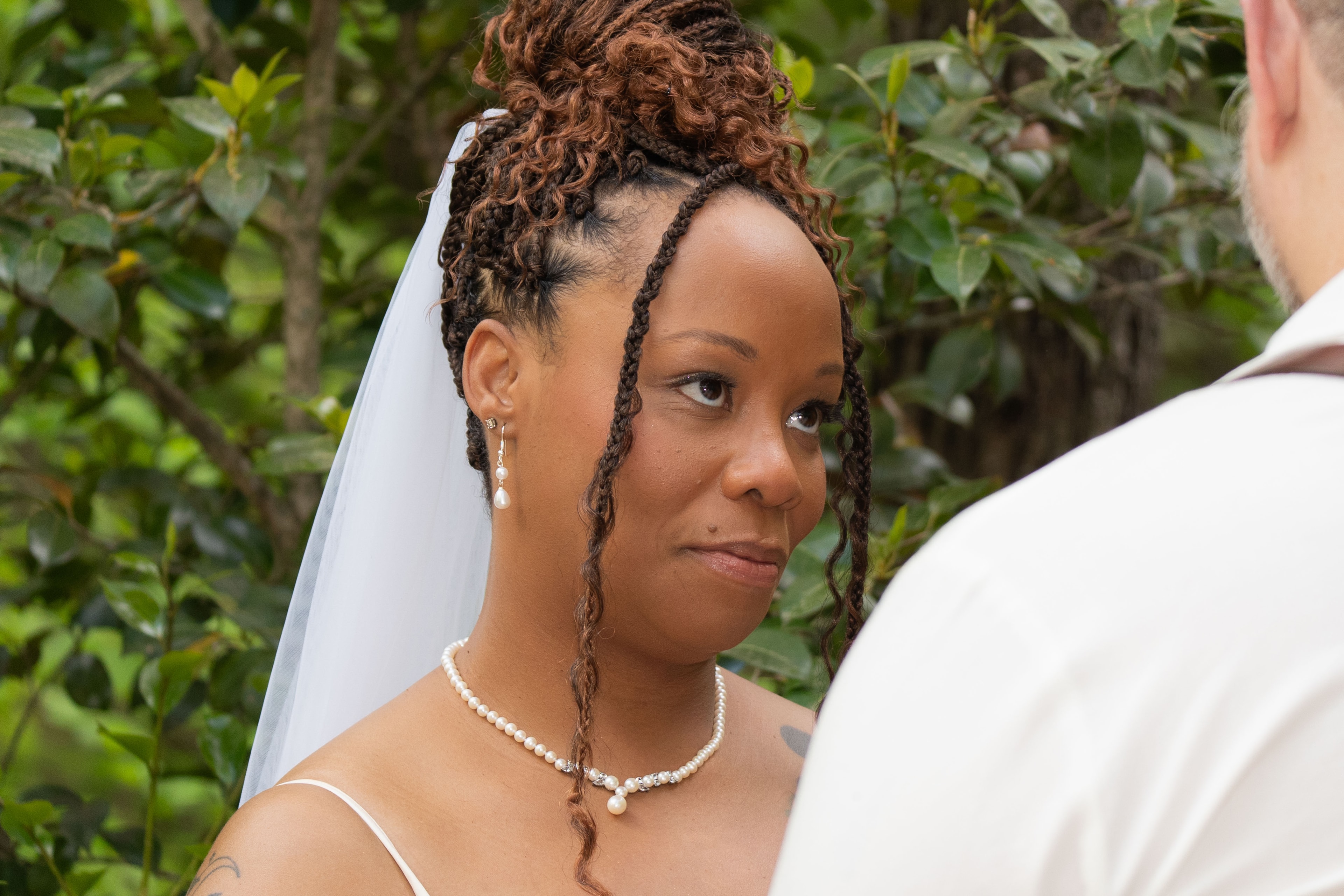 Bride gazing at groom during vows
